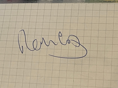 Mark Coxin nimikirjoitus paperilla.