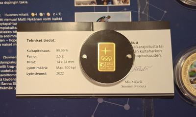 2,5 g Paavo Nurmi 9999 kulta laatta + 7 kullattua mitalia.