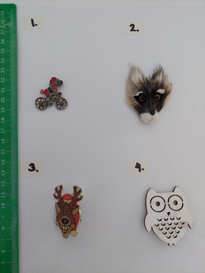 rintakoru nro 325 - 328 : papukaija, susi, poro, pöllö koru