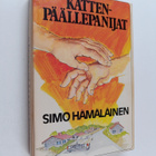Simo Hämäläinen : Kättenpäällepanijat : ilosteleva kertom... - pikkukuva 1