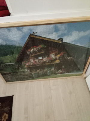 1000 palapeli kehyksessä
