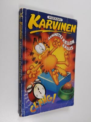 Jim Davis : Karvinen : aamuhetki kellon kallis