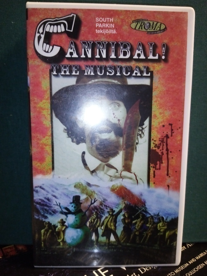 VHS : CANNIBAL THE MUSICAL ( TROMA) SIS POSTIKULU