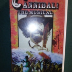 VHS : CANNIBAL THE MUSICAL ( TROMA) SIS POSTIKULU - pikkukuva 1