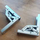 Ylöspäin aukeavat saranat - pikkukuva 1