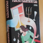 Outi Pakkanen : Katso naamion taa ( 1.p. 1987 ) - pikkukuva 1