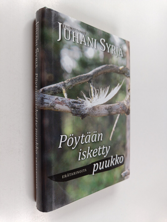 Juhani (toim.) Syrjä : Pöytään isketty puukko : erätarinoita