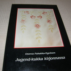 Onerva Puhakka-Hyvönen Jugend-kukka kirjonnassa - pikkukuva 1