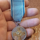 Liikunta ja urheilu mitalli kultaristein. - pikkukuva 1