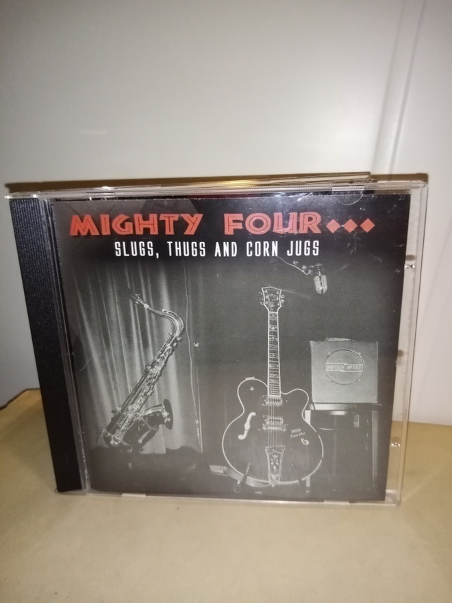 CD MIGHTY FOUR : SLUGS THUGS AND CORN JUGS