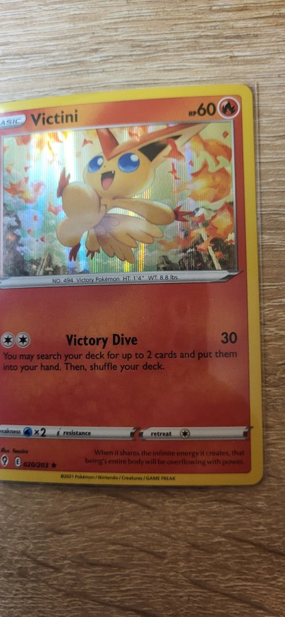 Victini #20 Pokemon Evolving Skies Rare Holo card