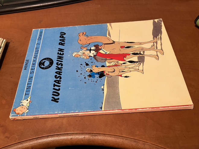 TINTIN SEIKKAILUT 7 KULTASAKSINEN RAPU HYVÄ