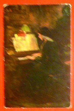 Nainen soittaa hämärässä iltamusiikkia   v.1923   (K9)