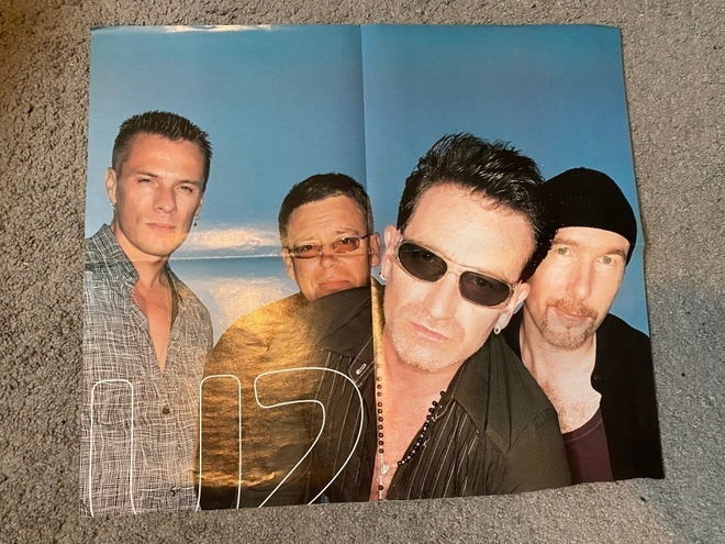 U2 juliste ja CD sinkku