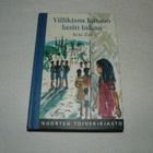 Alki Zei Villikissa katsoo lasin takaa - pikkukuva 1