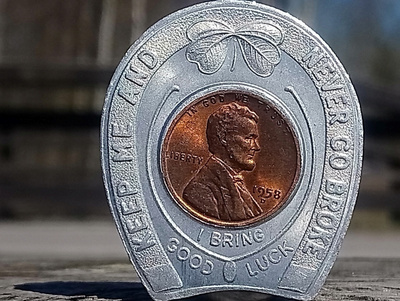 Onnenlantti - Never go broke. Halkaisija - 41 mm.