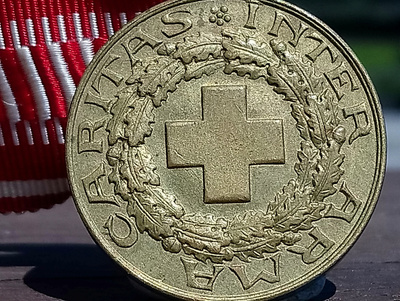 Pronssinen Suomen punainen risti mitali.  Halkaisija - 27 mm