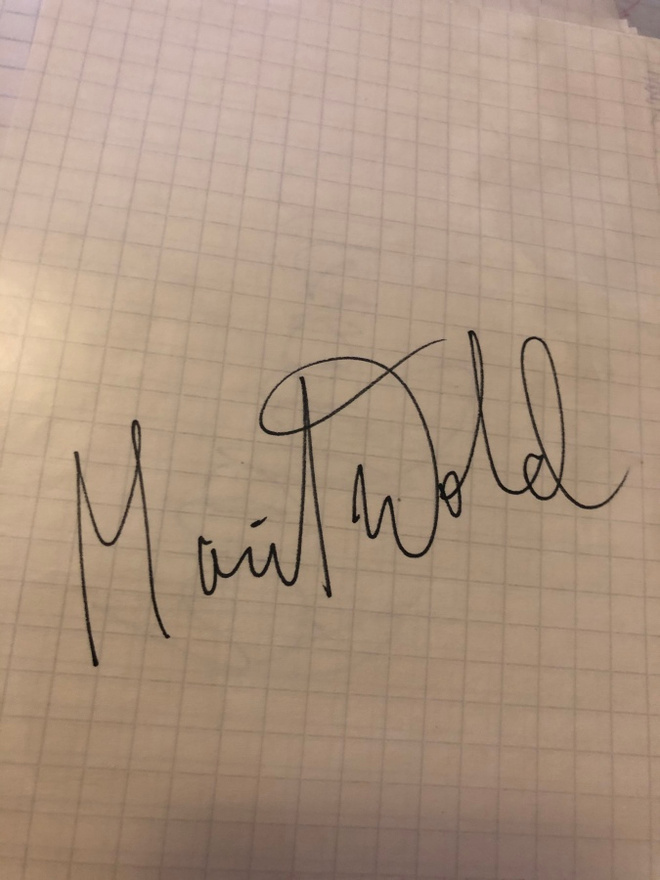 Marit Wold (Mikkelsplass) nimikirjoitus paperilla