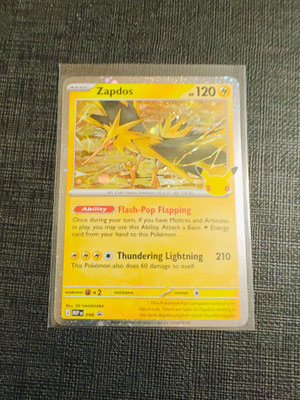 Pokemon 30th - Zapdos Cosmos Holo Black Star Promo