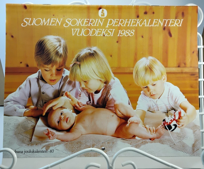 Seinäkalenteri v.1988 mukana joulukalenteri v.1987