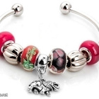 650 .. Tiibetin Hopea Lampwork Helmi .. Rannekoru - pikkukuva 1