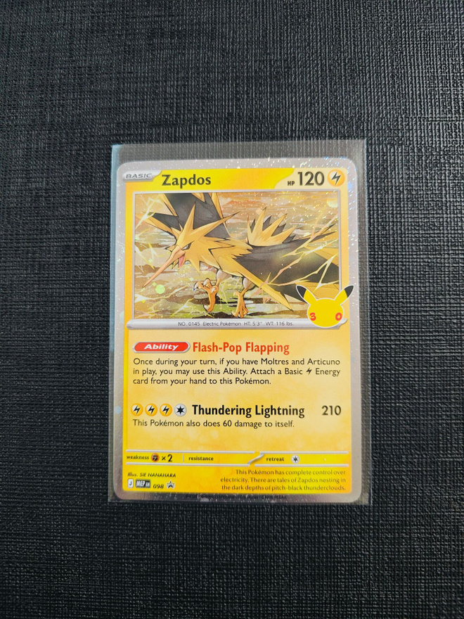 Pokemon 30th - Zapdos Cosmos Holo Black Star Promo