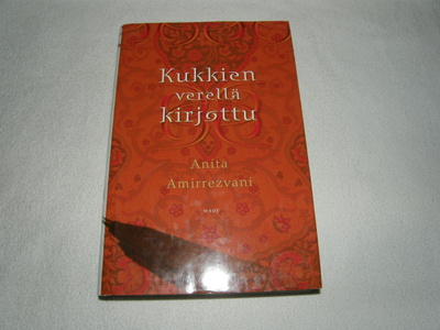 Anita Amirrezvani Kukkien verellä kirjottu -sid