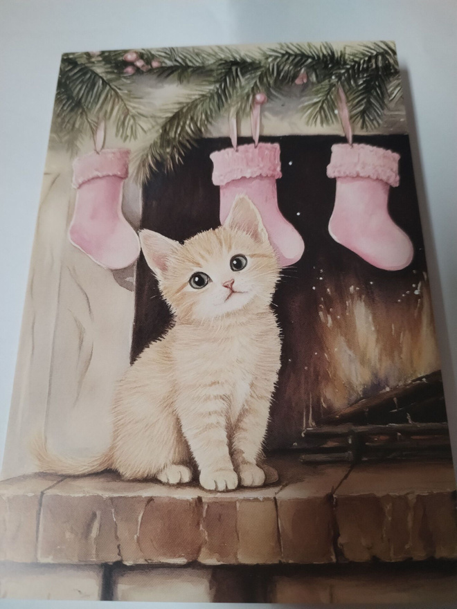 Kissa  kortti, kulkematon,vaikka kehyksiin tauluksi.