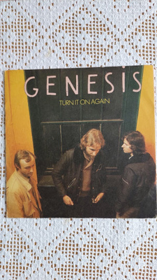 7" KANSI Genesis: Turn It On Again / Behind The Lines