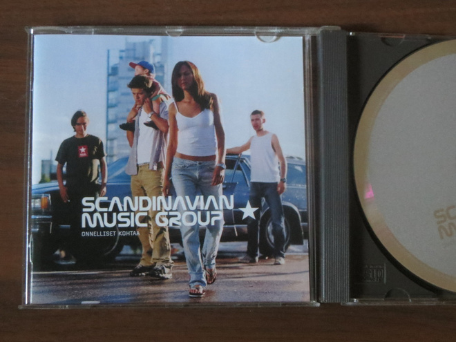 Scandinavian Music Group: Onnelliset kohtaa CD