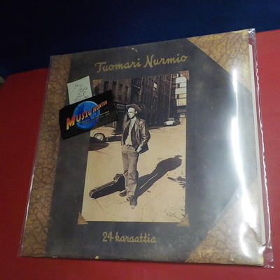 TUOMARI NURMIO 24 KARAATTIA M-/EX+ 2LP FIN -90 PRESS